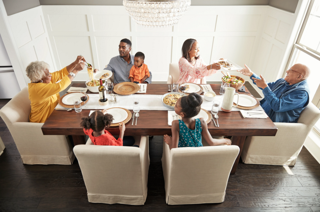 Family having breakfast at the dining table | Pilot Floor Covering, Inc.